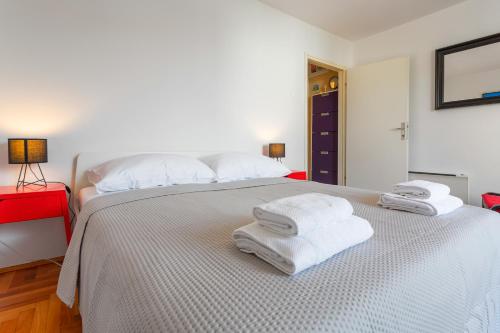 Posteľ alebo postele v izbe v ubytovaní Central View Apartment