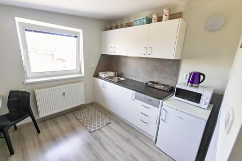 Dapur atau dapur kecil di Apartmán Theo