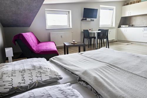 Postel nebo postele na pokoji v ubytování Apartmán Theo