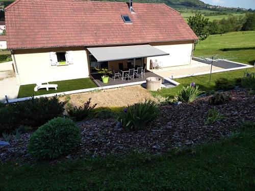 an aerial view of a white house with a roof at chambre d hôtes à la campagne in Tilleux