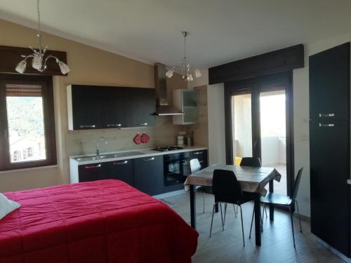 A kitchen or kitchenette at Casa Vacanze Villa Rosetta