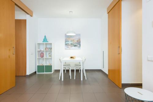 Kuchyň nebo kuchyňský kout v ubytování Apartamentos Cornellalux