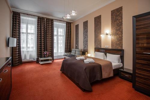 Katil atau katil-katil dalam bilik di RESIDENCE GOETHE -"U Tří mouřenínů"