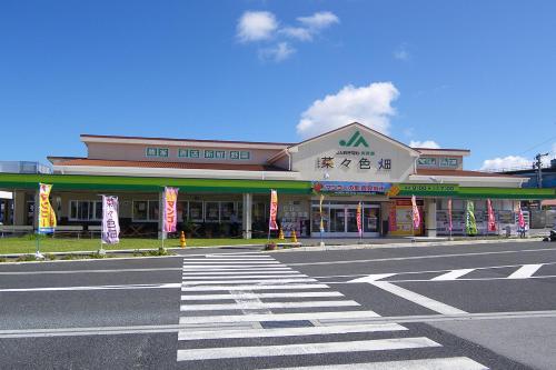 an empty street in front of a building at TerraceRin YN14 in Tomigusuku