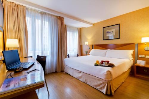 Oca Villa de Avilés Hotelにあるベッド