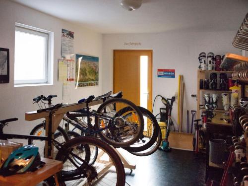 a room with two bikes on display in a store at Landhaus Gastein in Dorfgastein
