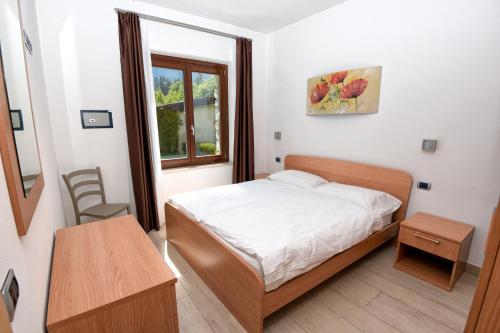 En eller flere senge i et værelse på Villa San Valentino - Ruculì Hospitality