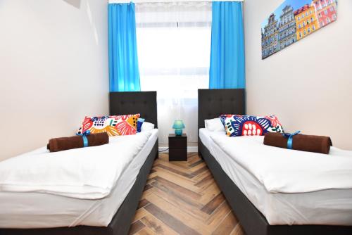 Lova arba lovos apgyvendinimo įstaigoje DUKES Apartments - Wita Stwosza