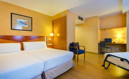 Oca Villa de Avilés Hotelにあるベッド
