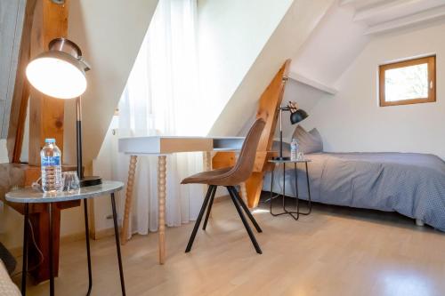 Ein Bett oder Betten in einem Zimmer der Unterkunft B&B L'Orée du Bois Bourgogne - Adults Only