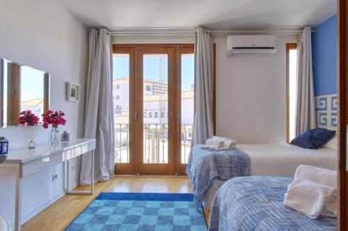 Postel nebo postele na pokoji v ubytování Casa da Avó