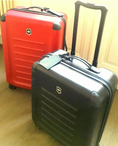 two pieces of luggage sitting next to each other at Lido Hotel in Katerini
