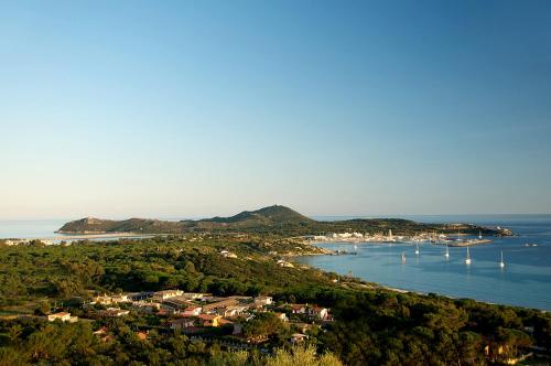 an aerial view of a bay with boats in the water at Hotel Fiore Di Maggio in Villasimius