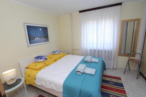 Posteľ alebo postele v izbe v ubytovaní Apartment Amabile