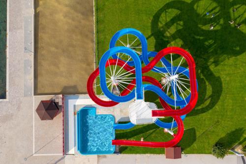 an aerial view of a water park with a play structure at Dependences - San Simon Resort in Izola