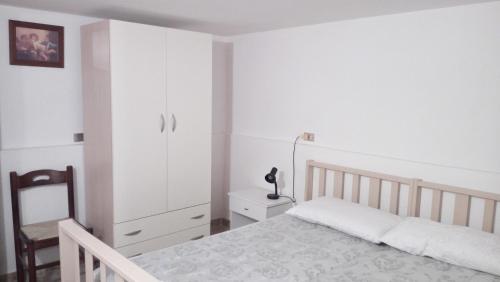 A bed or beds in a room at Villa Aquarium