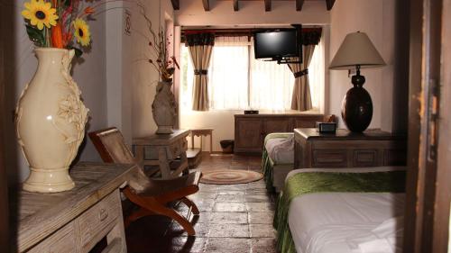 Кровать или кровати в номере Villa Bonita Les Terrasses