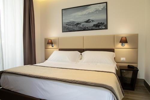 Hotel Palazzo Argentaにあるベッド