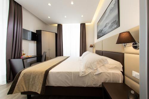Hotel Palazzo Argentaにあるベッド