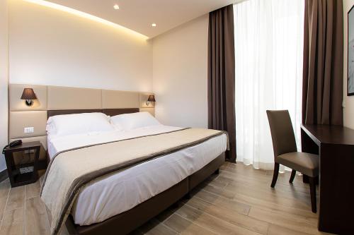 Hotel Palazzo Argentaにあるベッド