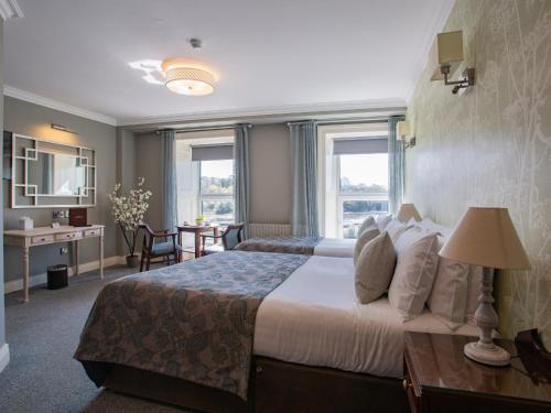 Säng eller sängar i ett rum på Eccles Hotel and Spa