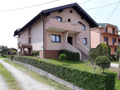 a house on the side of a road at Apartman Kristian Zagreb Airport in Velika Gorica