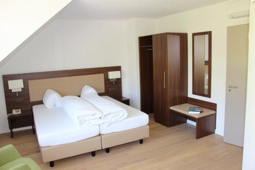 Seehotel Delphinにあるベッド