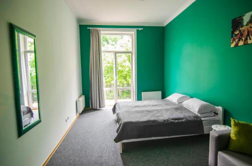 Ένα ή περισσότερα κρεβάτια σε δωμάτιο στο Friends Hostel Lviv Rustaveli str
