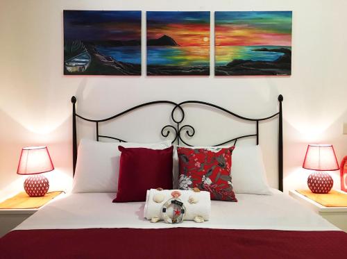 Appartamenti Monacò tesisinde bir odada yatak veya yataklar