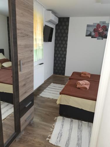 Katil atau katil-katil dalam bilik di Lili Apartman