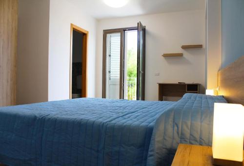 Postel nebo postele na pokoji v ubytování Bed Ponente