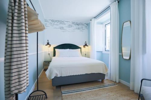 Voodi või voodid majutusasutuse Belém- Charming Apartments toas