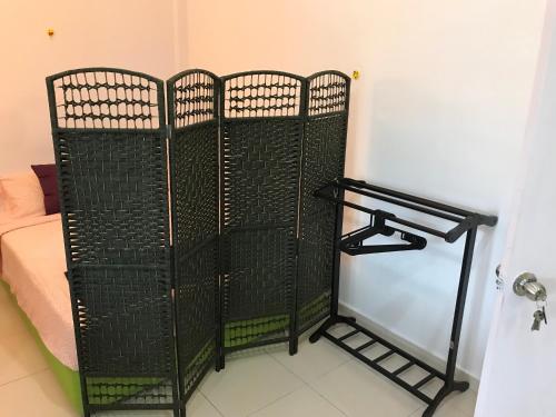 Ένα ή περισσότερα κρεβάτια σε δωμάτιο στο Bukit Bentong Homestay