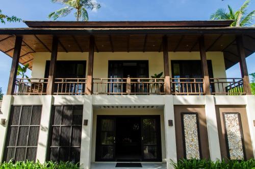 an image of a house with a balcony at Kirikayan Residences Koh Samui in Mae Nam