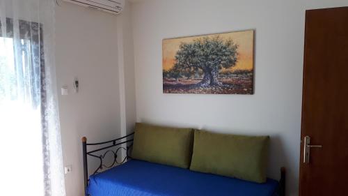Giường trong phòng chung tại Villa Kallimanis