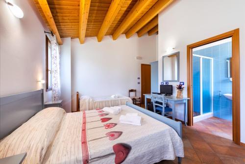 Katil atau katil-katil dalam bilik di Il Dosso Agriturismo