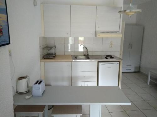 Una cocina o cocineta en Maini Studios