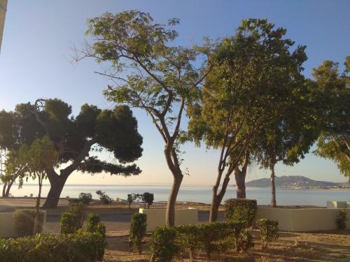 a view of the beach from the house at DREAM & HARMONY in Artemida