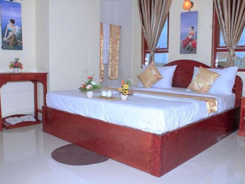 Uma cama ou camas num quarto em Spean Meas Hotel