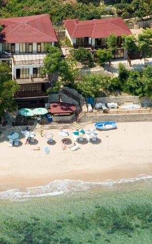 an aerial view of a beach with chairs and umbrellas at Morski Briag Hotel in Golden Sands