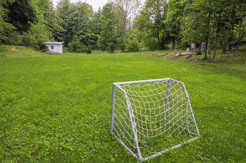 a soccer goal in the middle of a field at Dren - Banjska stena in Mitrovac