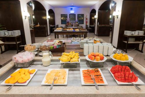 a buffet of fruits and vegetables on a table at Plaza Caldas da Imperatriz Resort & Spa in Santo Amaro da Imperatriz