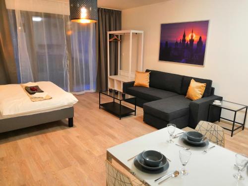 Posezení v ubytování Prima Family Apartments