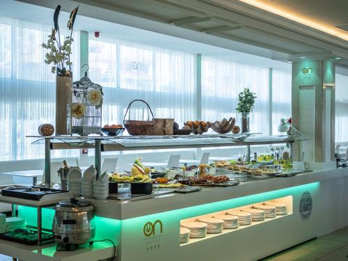 a buffet line with a lot of food on display at ON Hotels Oceanfront Adults Designed in Matalascañas