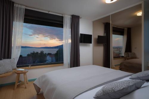 Posteľ alebo postele v izbe v ubytovaní Villa Marulovo Hills