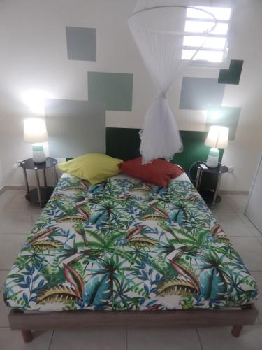 Cama o camas de una habitación en La kay dédé avec piscine