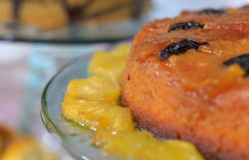 a close up of a plate of food with pineapple at Simas Praia Hotel in Aracaju