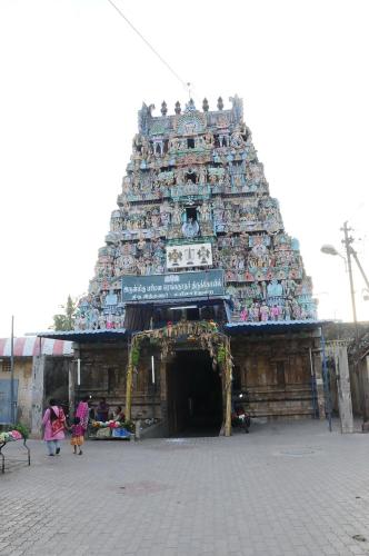a large building with people standing in front of it at Ranga Residency in Mayiladuthurai