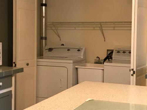 Kuchyň nebo kuchyňský kout v ubytování Coolis Apartment