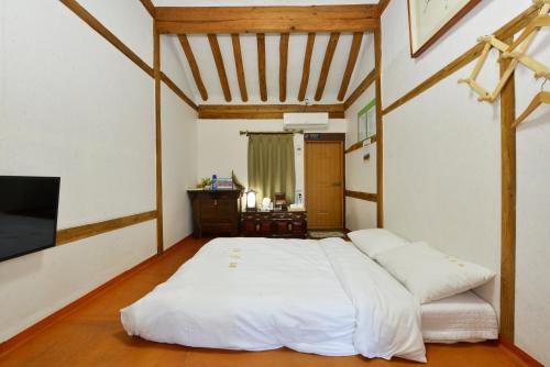 Dasomchae Hanok stayにあるベッド